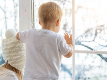 Kids looking outside in winter