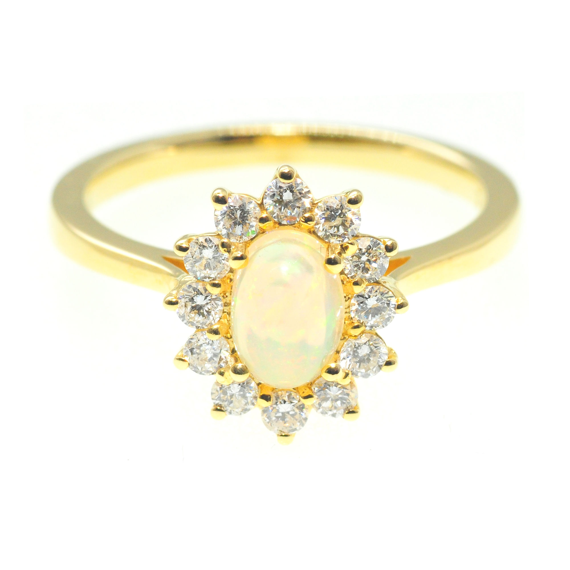 0.68ct opal 0.36ct of diamonds 18ct yellow gold dress ring