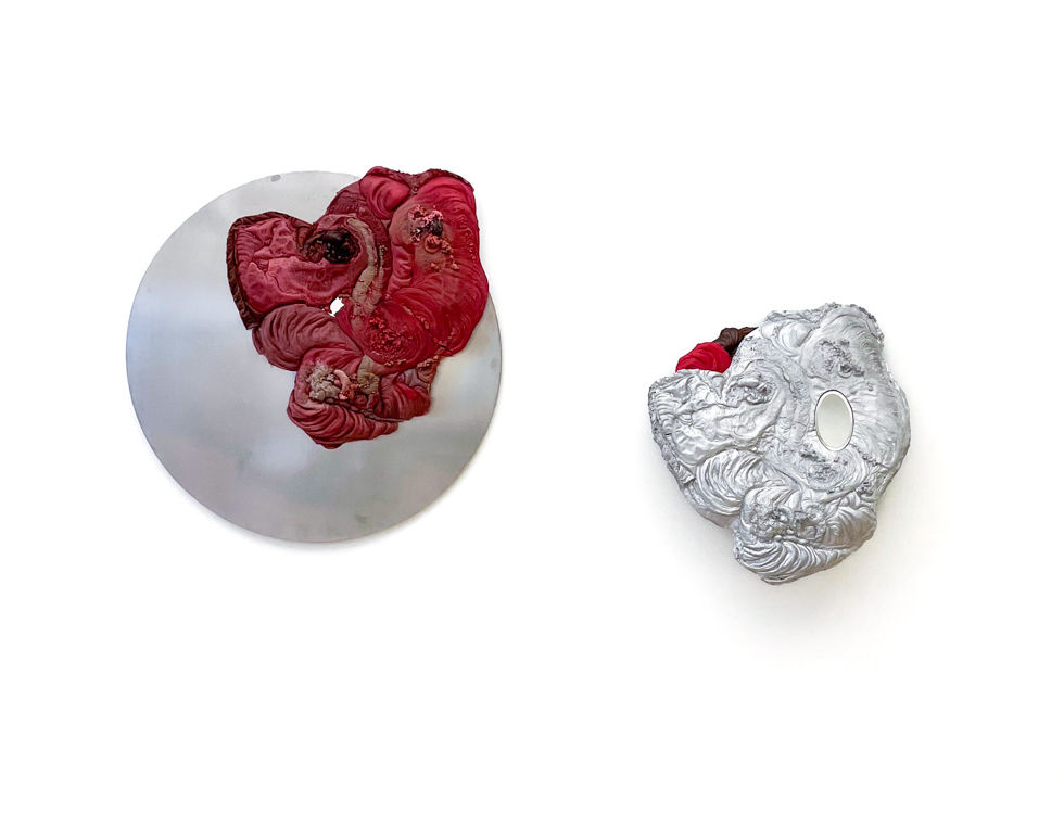 Image of a wall hanging sculpture made from wax, aluminum and steel