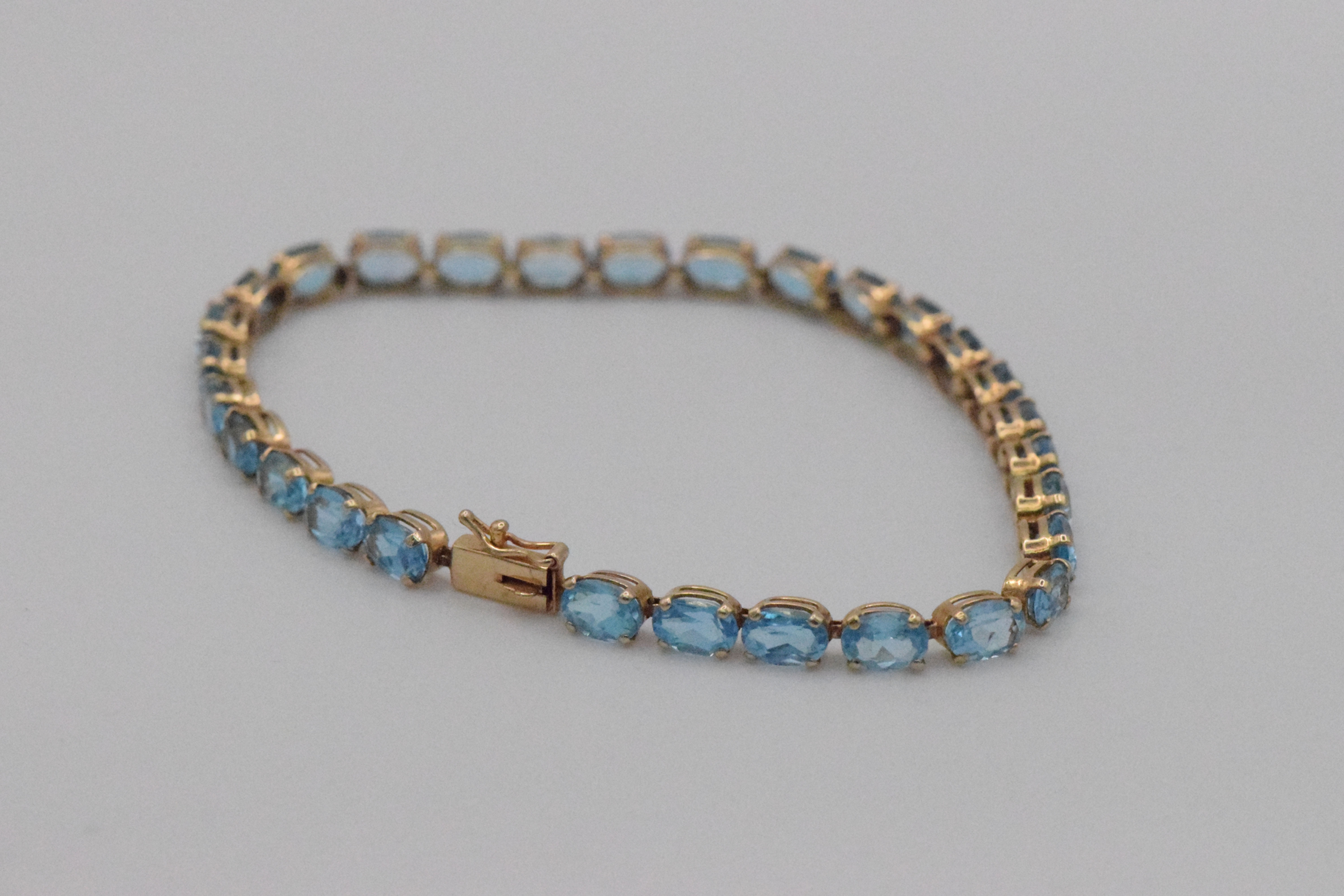9ct gold Oval Topaz Tennis Bracelet