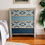 Thumbnail: Bespoke chest of drawers in grey/beige/blue/teal with geometric patterns