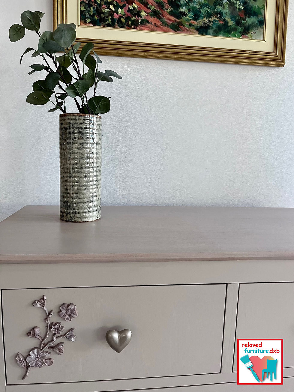 Thumbnail: restyled chest of drawers in soft beige with cherry blossom decor