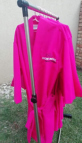 pink spa gown on gown rail