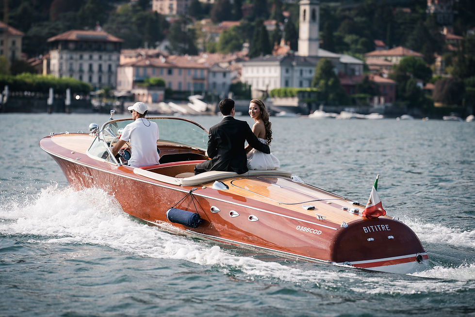 Bride and groom Riva speedboat.jpg