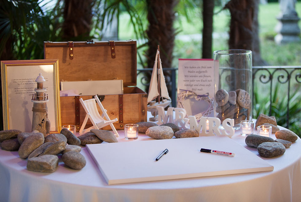 19. Stones and pencils for the guest book at Villa Rusconi Clerici.JPG