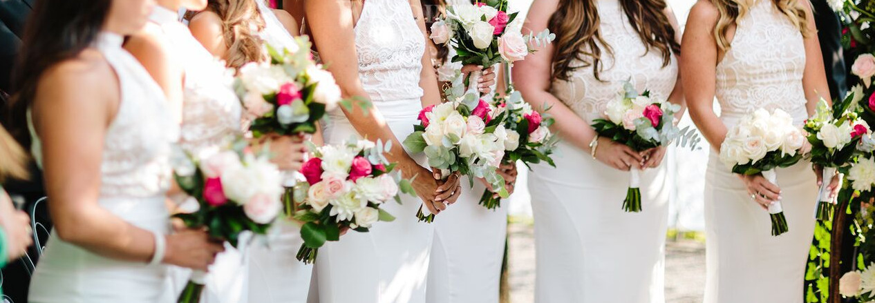 Getting married at Villa Cipressi. Bridesmaids in a line.