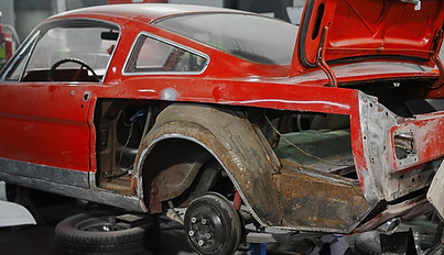 Photograph - 65 Mustang with Quarter Panels Cut open to expose rust