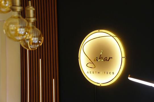 Sahar Aesthetics clinic logo with warm lighting – advanced skin treatments in Peterborough