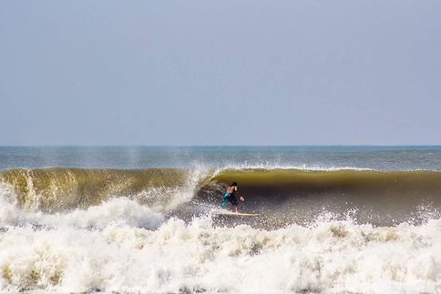 surfing biggest wave in Goa.