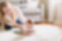 Baby practicing tummy time to strengthen neck muscles