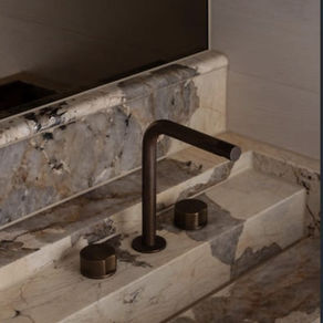 Bathroom vanity with stone top manufactured and quality-checked for a builder