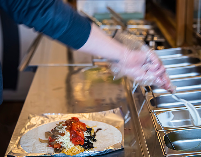 Food being prepared at plan burrito at Loughborough