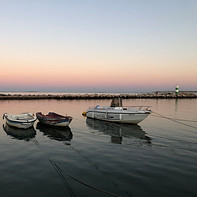 fishermans boats in sunset in Fuseta
