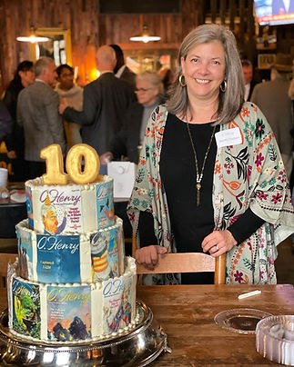 decorated cake with a photo of the owner of dessert du jour