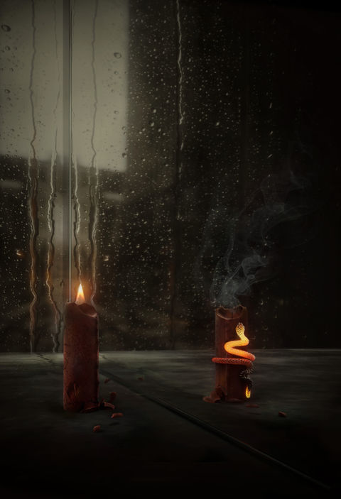 two candles in front of a rainy window, one is lit up the other one put out with a snake of fire crawling up around it