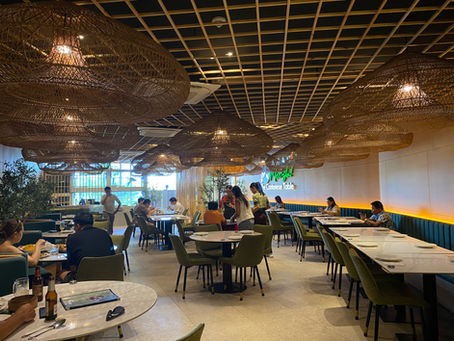 Inside the restaurant with tables and chairs