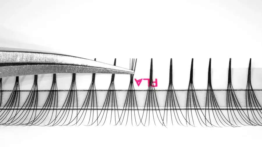 Thumbnail: Tweezers picking up the base and showing the base of the 2.0 Promade Fans