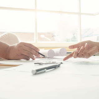 hands-engineer-working-blueprint-construction-concept-engineering-tools-vintage-tone-retro