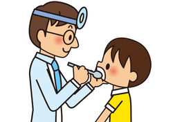 歯をみてもらう子供