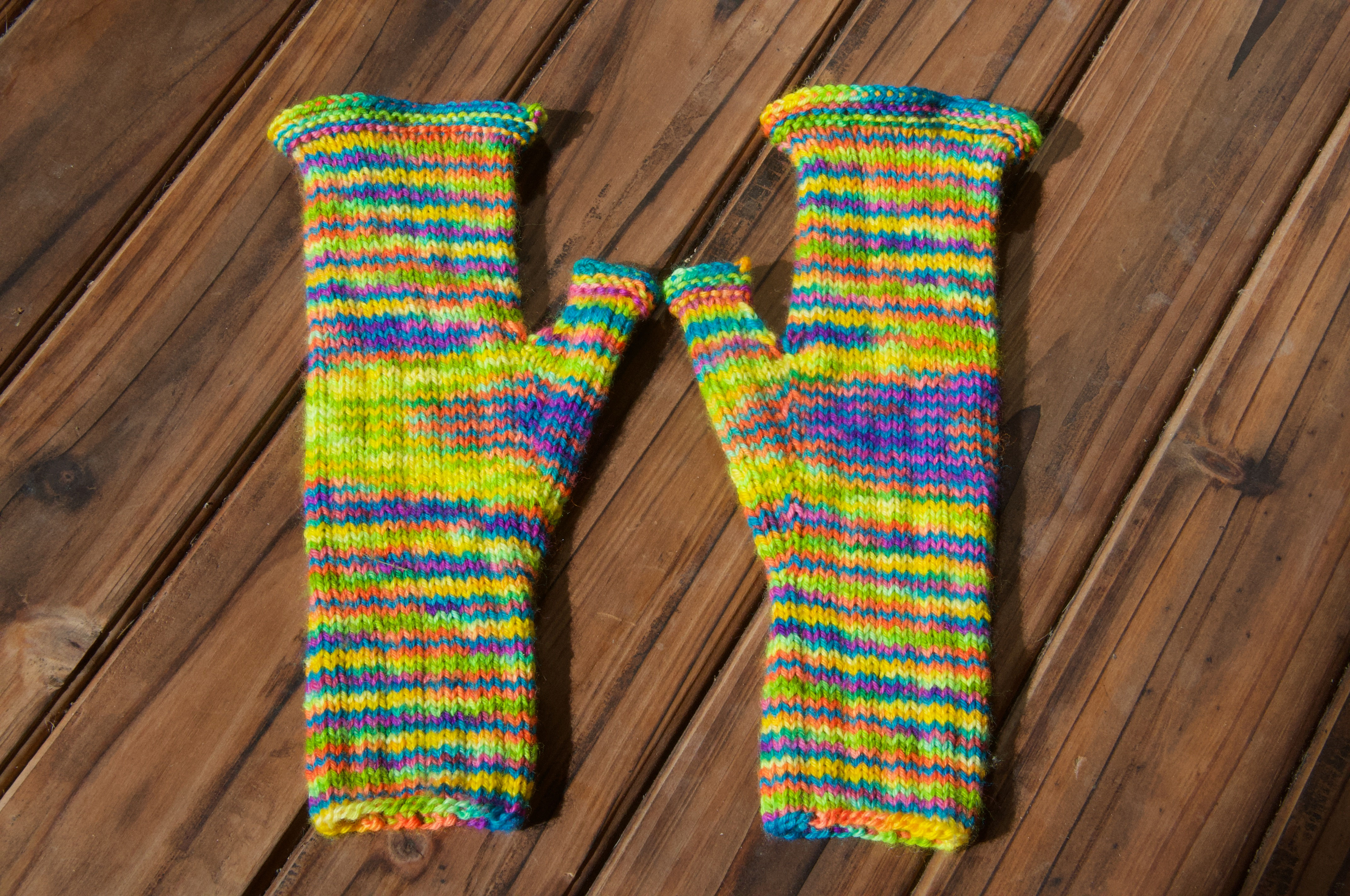 Hand knitted fingerless gloves