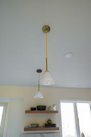 Before and after of outdated to modernized Elk River electrical panel
