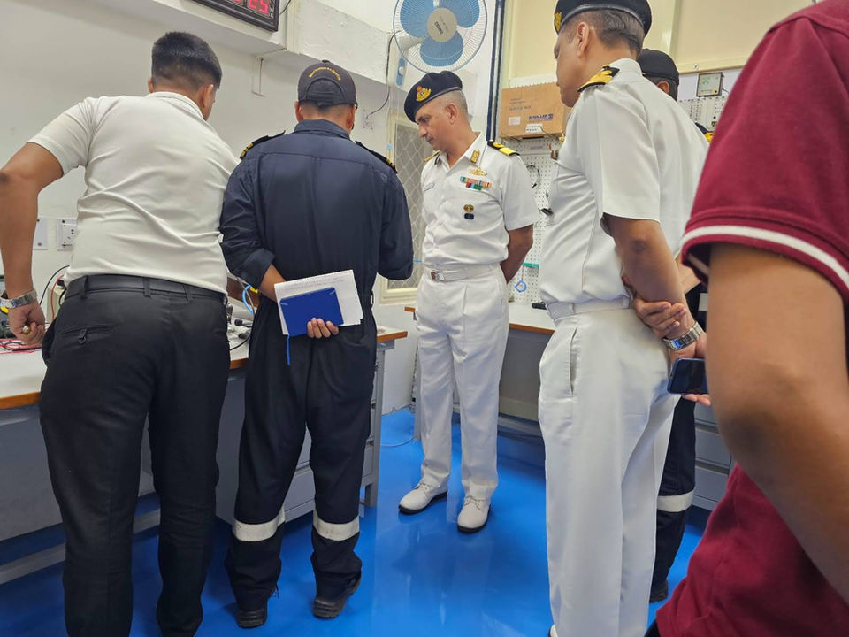 Officers reviewing documents at Manthan Marines