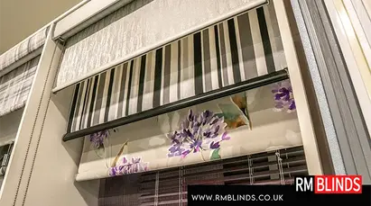 A selection of roller blinds in the showroom