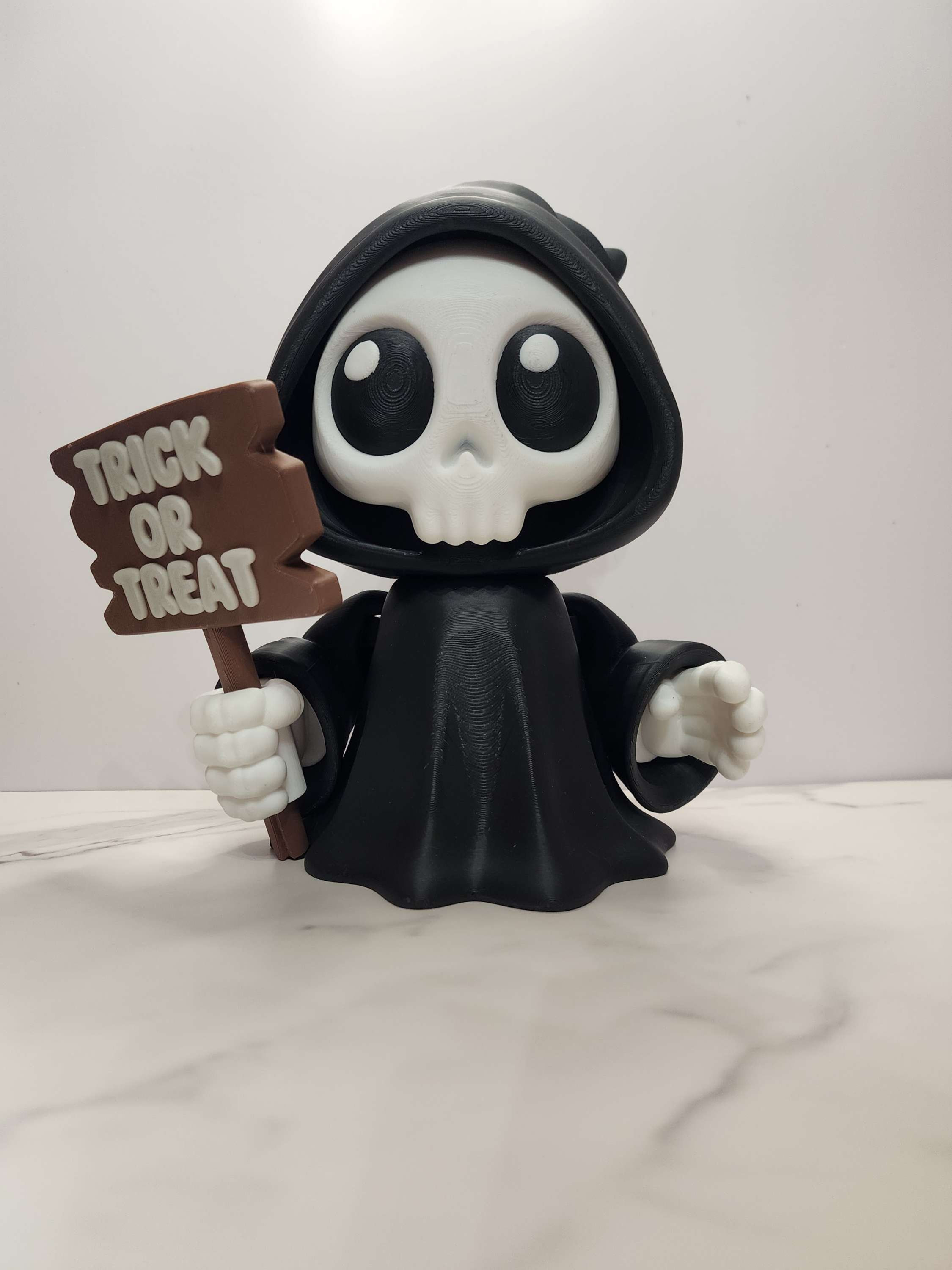 Grim reaper w/ interchangeable sign