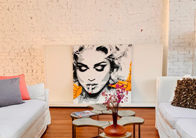 Madonna by Rockstars & Flowers in The Loft at The Edge Wilson. Rockstars & Flowers is a locally owned studio and their paintings are perfect in this space.