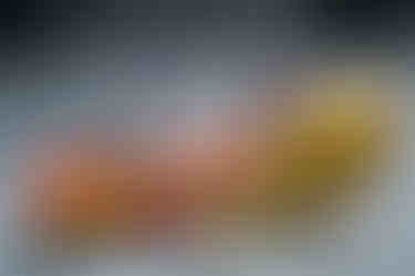 two boys being towed on tubes