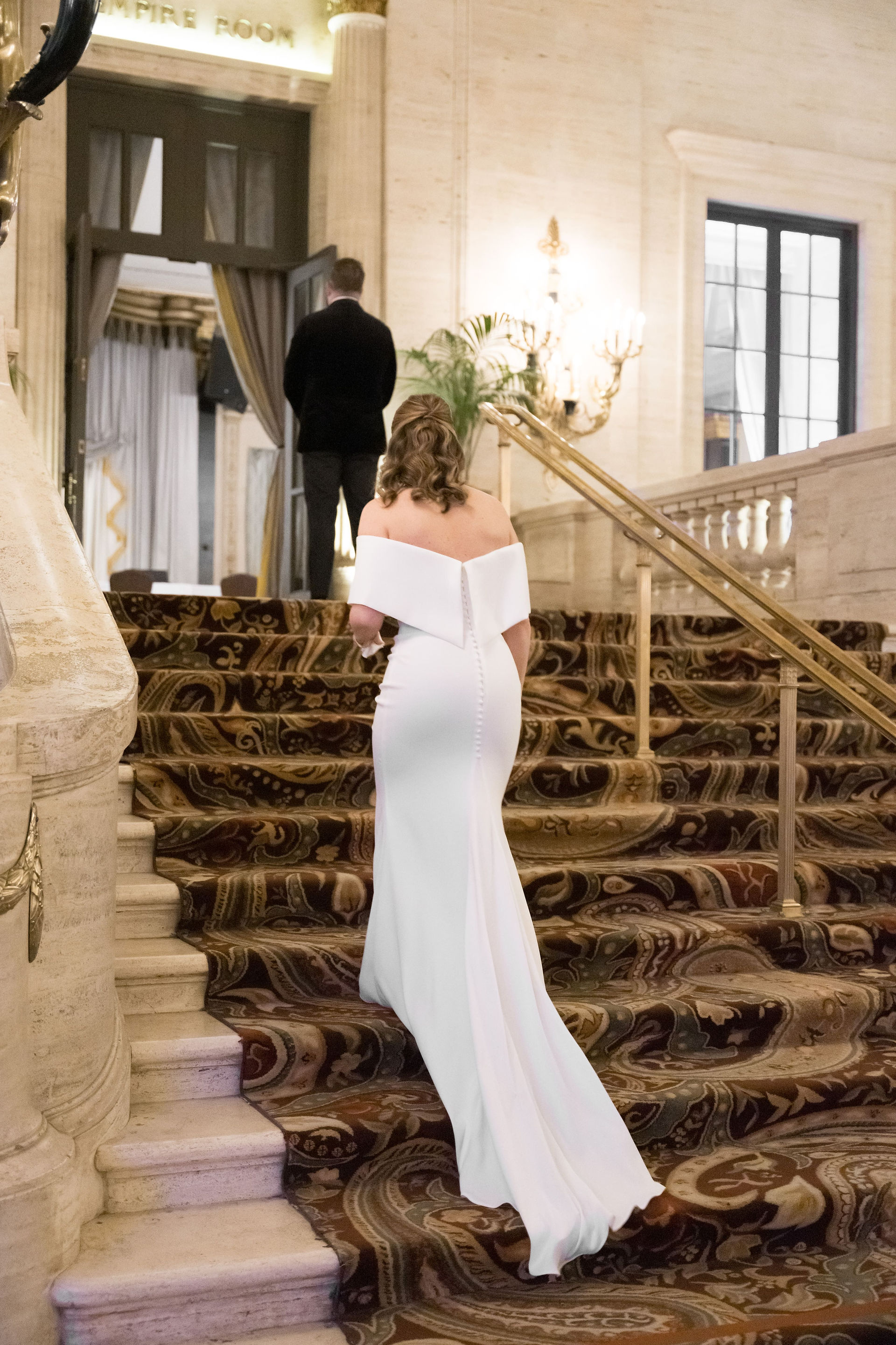 Bride walking up stairs at Art Institute Chicago