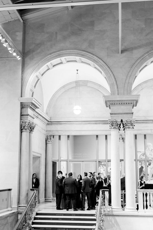 High ceilings and archways and guests standing around