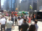 Many event attendees and food trucks at an event in Chicago