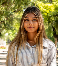 My name is Riya, and I am one of the co-presidents of HerScope. I am a second-year biopsychology major, with a minor in women's studies. I became interested in women's health after experiencing in my community how lack of education and stigma can affect how women perceive themselves and truly believe that what is scientifically "normal" is shameful and to be hidden. As co-president and an advocate for women's health education, HerScope allows me to spread awareness about women's health and reach our Davis community.