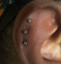 Triple helix piercings