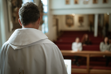 Priest in Church.png