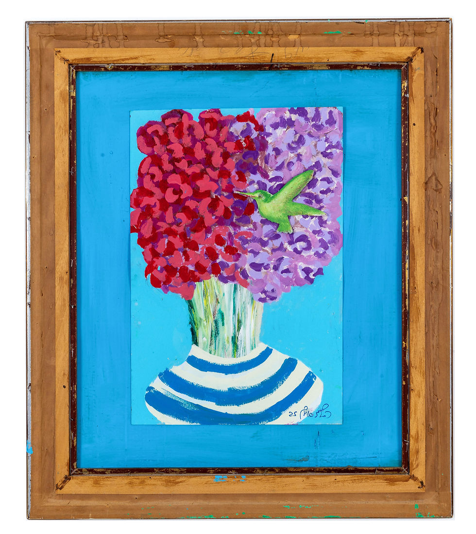 Red and purple flowers in a blue and white vase with a turquoise background