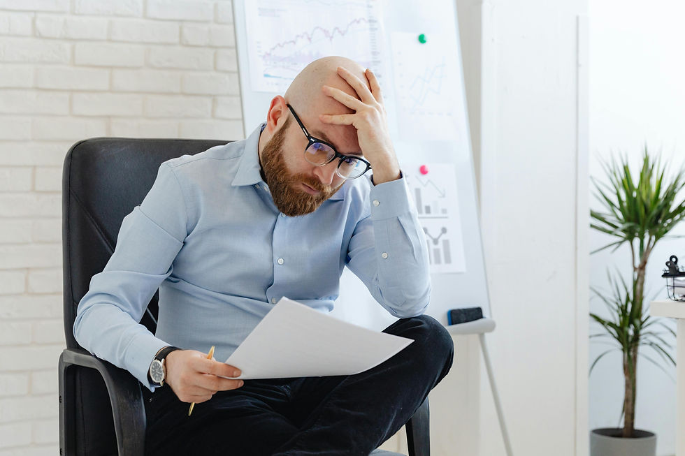 A person looking at a complex data dashboard, appearing confused or thoughtful.