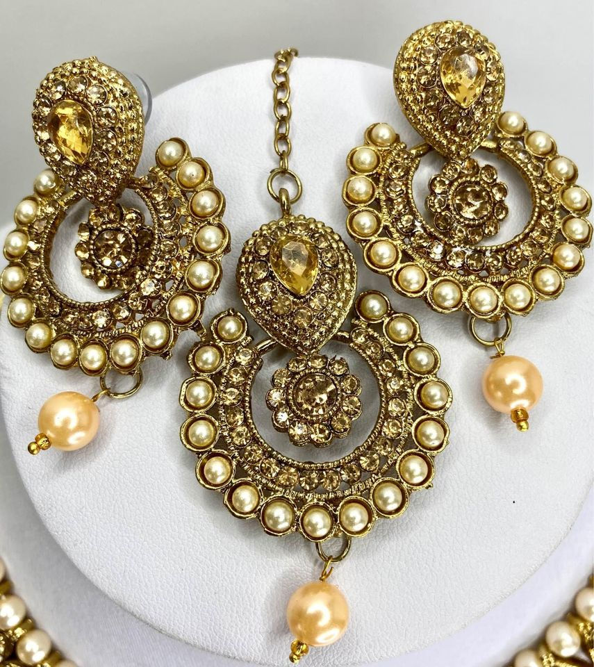 Thumbnail: Bronze and Peach Pearl Stone Set Necklace Set