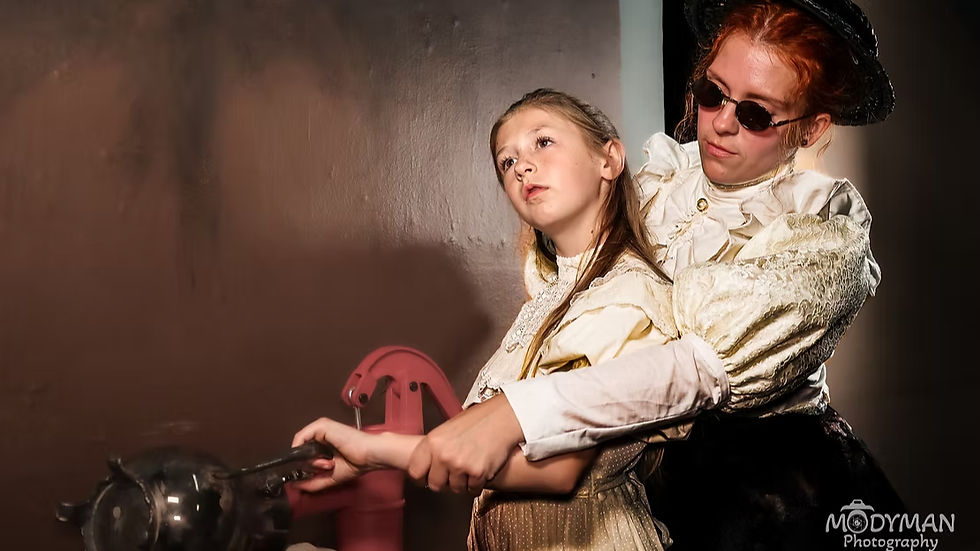 From Left: Annabelle Finch as Helen Keller, Sara Davis as Annie Sullivan (Photo by Eric Modyman)