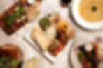 The mezze platter (center) and other Mediterranean dishes at Zov's, which opened a new location in San Clemente in late April. Photo courtesy of Zov's