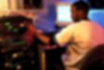 A UCI Student in 1998 works in The Gassman Electronic music studio, part of the Department of Music. Photo courtesy of UC Irvine Libraries, Special Collections and Archives. © UC Regents