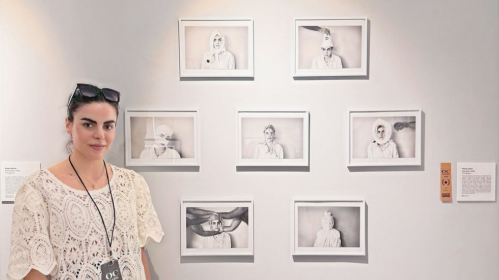 Mahta Jafari poses beside her work "Opression." Photo courtesy of Mahta Jafari