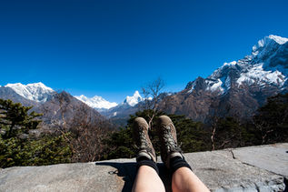 A Lifestyle photo of feet resting on a ledge in nepal
For Getty Images

