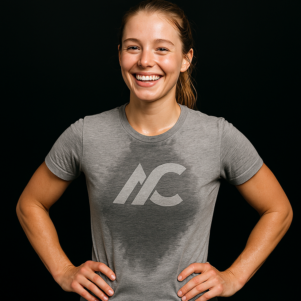 Smiling woman wearing a sweat-activated workout shirt with motivational AC logo revealed during training