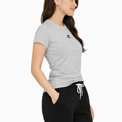 Women’s workout t-shirt in heather gray with minimal AC logo, lightweight athletic tee designed for gym training and everyday