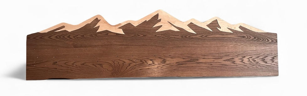 Mountain-inspired wooden wall organizer crafted from ash with maple inlay, designed for ski and snowboard storage