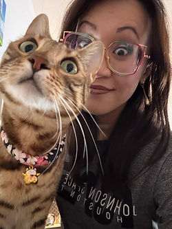 Kathy Enriquez author and artist with her cat Nezuko