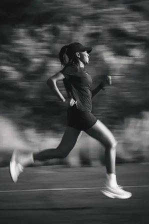 Black and white panning shot of athlete in motion, Cape Town