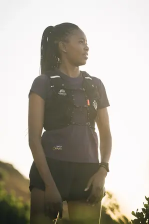 Sports apparel photographer Cape Town — backlit portrait with Aonijie vest